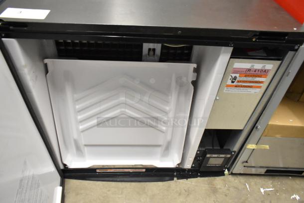 2025 Manitowoc IDT0900A-261 ice machine, stainless steel, 851 lb capacity, visible controls. Scratch and dent new condition.