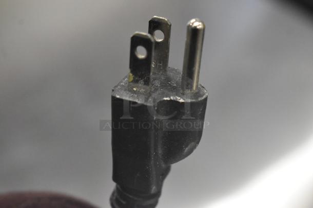 Close-up image of the power plug for an Estella 348SM30 Spiral Dough Mixer, showing a black three-prong plug.