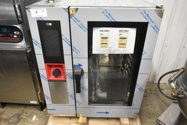 Brand new Blodgett AETE101R stainless steel commercial electric combi convection oven, 208V, 3-phase, with visible scratches.