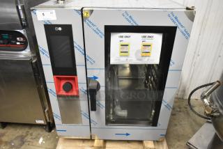 Brand new Blodgett AETE101R stainless steel commercial electric combi convection oven, 208V, 3-phase, with visible scratches.