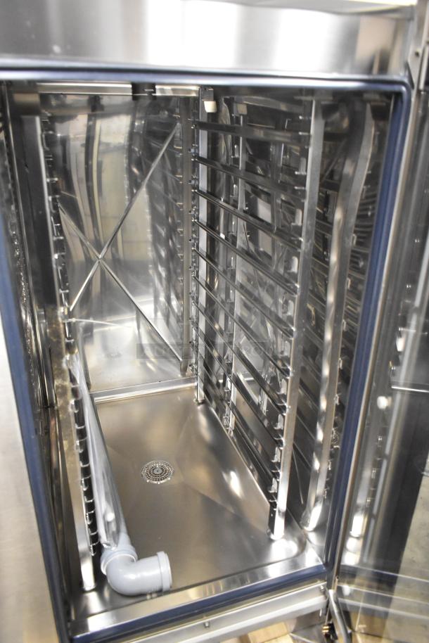 Brand new Blodgett AETE101R stainless steel combi convection oven interior. Scratch and dent condition, electric, 208V, 3 phase.