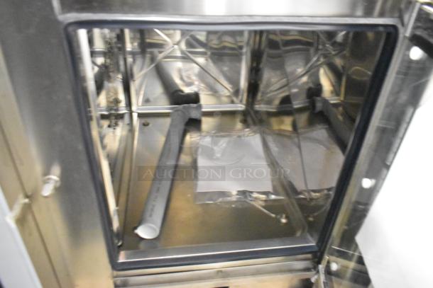 Bakers Pride AEHE061R stainless steel commercial combi convection oven, brand new with minor scratches. 208V, 3-phase.