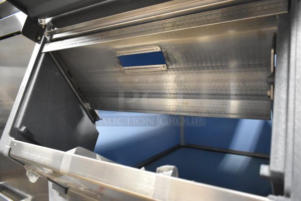 Brand new Scotsman FS1222A-32B stainless steel commercial ice head, scratch and dent condition, shown with bin and stand.