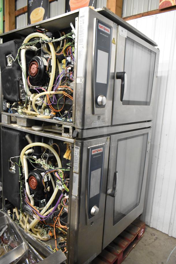 Rational SCCWE62/SCCWE102 stainless steel commercial convection ovens, electric, 480 volts, 3 phase, internal wiring visible.