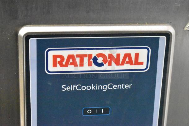 Rational SelfCookingCenter label, blue with red logo, on stainless steel convection oven. Model SCCWE62/SCCWE102.