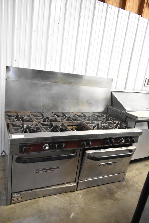 Southbend stainless steel 10-burner gas range with two convection ovens, backsplash, and overshelf. One spider grate missing.