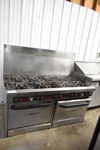 Southbend stainless steel 10-burner gas range with two convection ovens, backsplash, and overshelf. One spider grate missing.