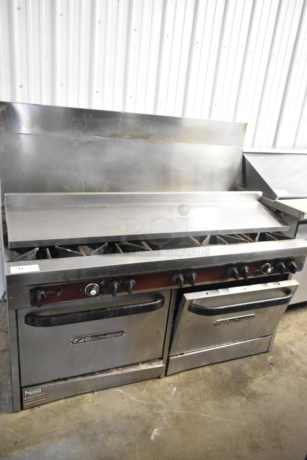 Southbend stainless steel commercial gas 10-burner range with 2 convection ovens, backsplash, overshelf. Missing 1 spider grate.