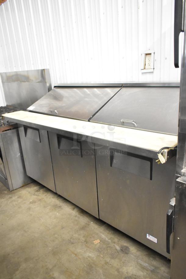 2021 True TSSU-72-30MB-ST-HC stainless steel sandwich salad prep table, bain marie top, on casters. 115V, 1 Phase.