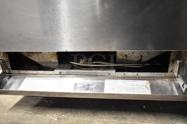 Vulcan 48C-SEFAAA stainless steel commercial gas range, 8 burners, convection oven, backsplash, on commercial casters.