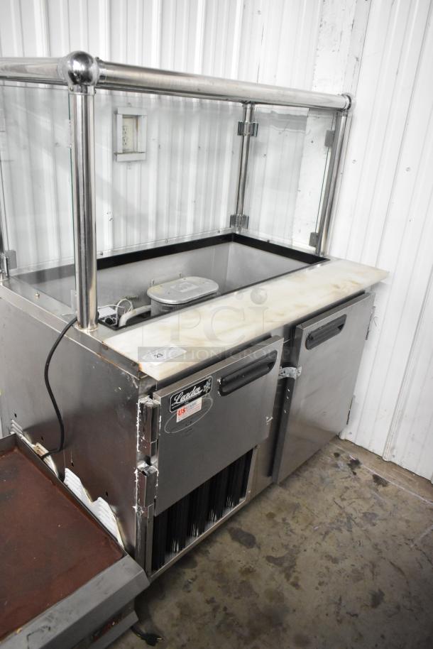 2016 Leader LM48 S/C stainless steel commercial prep table, 115 volts, 1 phase, with glass guard and dual doors.