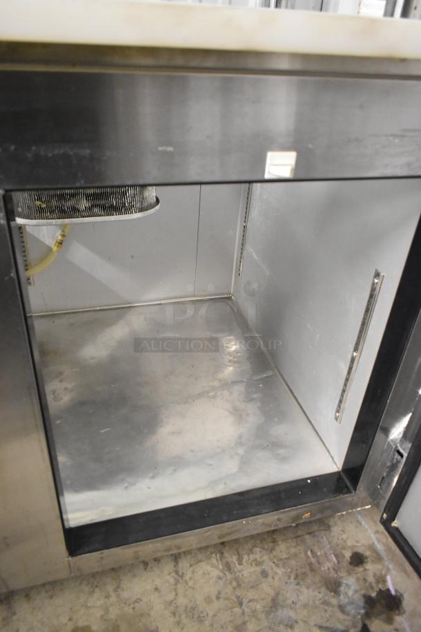 2016 Leader LM48 S/C stainless steel commercial prep table, 115 volts, 1 phase. Used condition, visible interior shelf.