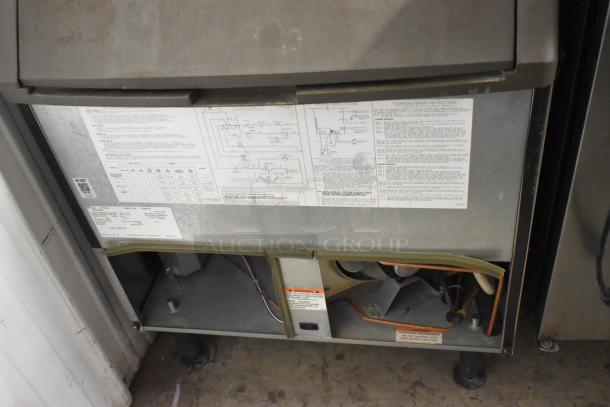 Manitowoc QF0406A Stainless Steel Ice Machine, 115V, 1 Phase. Features control panel with labels and wiring diagrams.