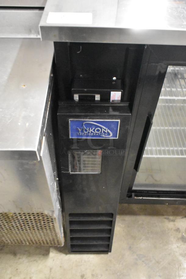 Yukon YBB49-2G-24SD metal back bar cooler, 2 glass doors, 115V, commercial use, excellent condition, visible branding.