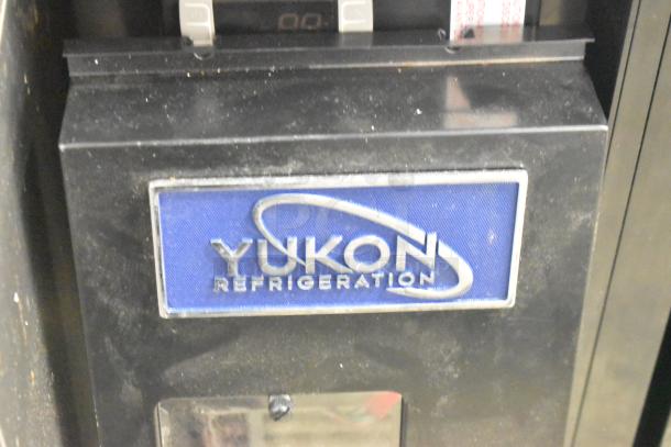 Yukon YBB49-2G-24SD 2-door back bar bottle cooler, commercial use, 115V. Features Yukon logo on panel.