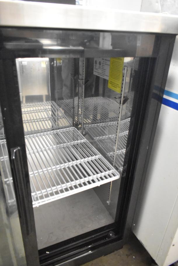 Yukon YBB49-2G-24SD 2 Door Back Bar Bottle Cooler, metal, glass doors, adjustable shelves, 115V, excellent condition.