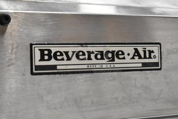 Beverage Air SMF49 stainless steel commercial milk cooler with commercial casters; 115 volts, 1 phase. Made in USA label visible.