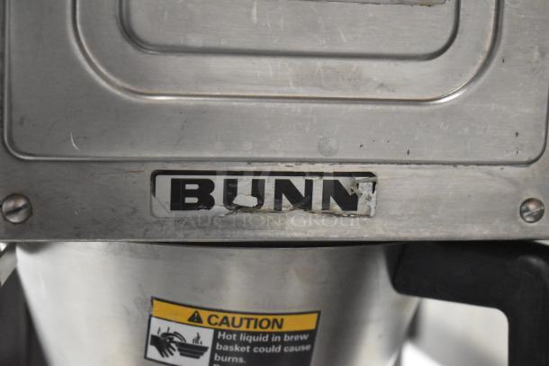 Bunn G-9 commercial coffee grinder with visible branding and caution label. Used condition. 115 volts, 1 phase.