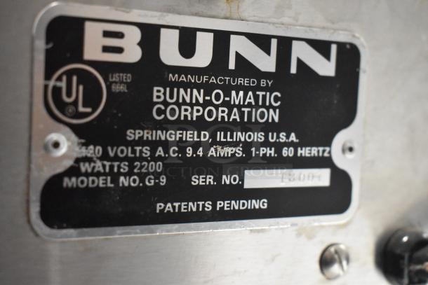Bunn G-9 metal commercial coffee bean grinder, 115V, 1-phase. Features manufacturer label indicating model and specs.