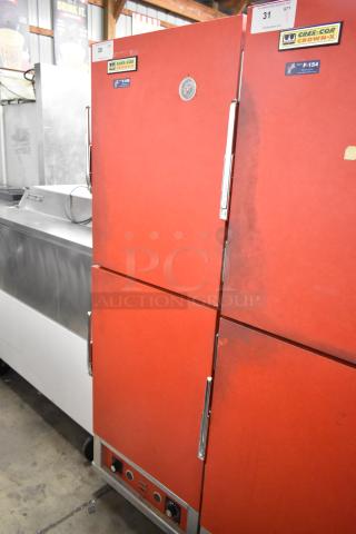 Cres-Cor H1381834 heated holding cabinet with red metal exterior on casters. Features temperature dial and brand label, 120V, 1 phase.