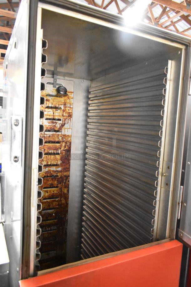 Cres-Cor H1381834 metal heated holding cabinet on casters, 120V, 1 phase. Features interior shelving and temperature gauge.