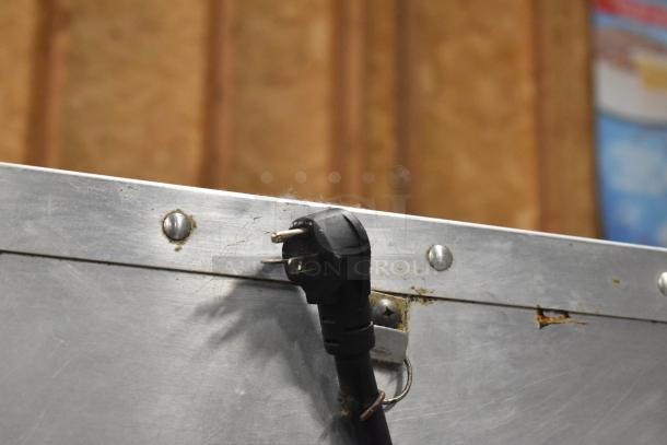 Cres-Cor H1381834 metal heated holding cabinet with visible power cord and plug. Surface shows minor wear. 120 Volts, 1 Phase.