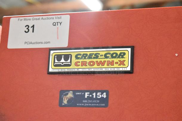 Cres-Cor H1381834 metal heated holding cabinet, Crown-X label, on commercial casters, 120V, 1 phase, auction tag visible.