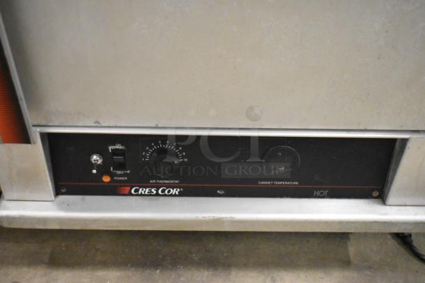 Cres-Cor 5495 039 metal commercial heated holding cabinet, features thermostat, power switch, 120V, 1 phase, on casters.