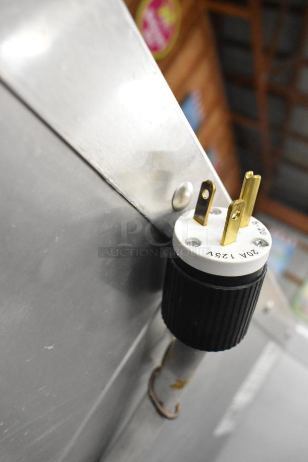 Cres-Cor 5495 039 heated holding cabinet plug detail, 120V, metal, shows prongs and housing condition.