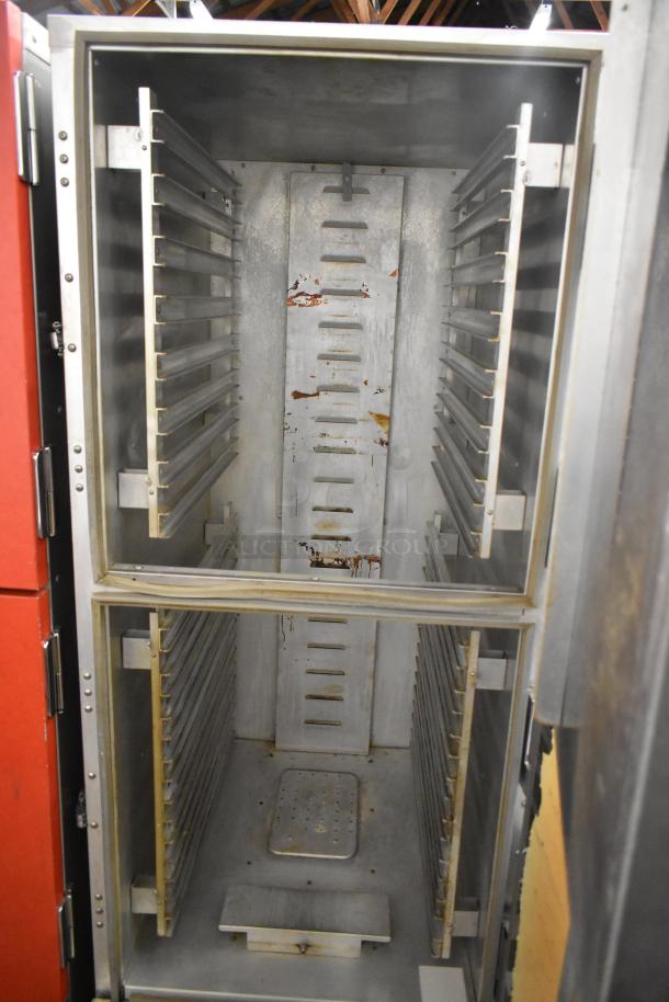 Cres-Cor 5495 039 metal commercial heated holding cabinet with racks, on casters, showing interior wear, 120 volts, 1 phase.