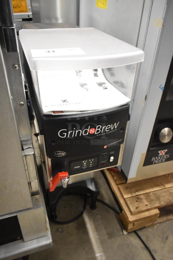 Grindmaster Grind'n Brew-10H coffee maker with grinder, hot water dispenser, metal brew basket. Stainless steel. 120V, 1 Phase.