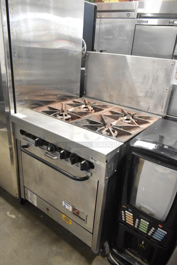 Southbend 1364D stainless steel commercial range, natural gas, 4 burners, oven, back splash, used condition.