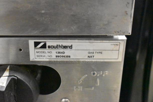 Southbend 1364D stainless steel range label, model 1364D, gas type NAT, serial number 99G66356, with control knob.