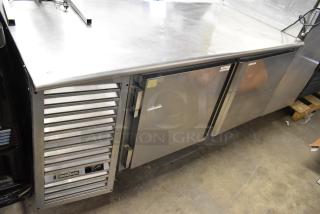 Traulsen UC2HT stainless steel 2-door undercounter cooler, 115V, 1 phase, with vented panel, commercial kitchen equipment.