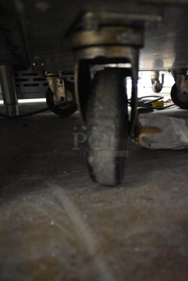 EPCO INSA61618H metal commercial heated holding cabinet with robust commercial casters, operational at 120 Volts, 1 Phase.