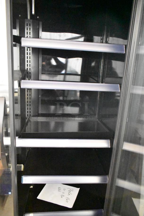 2022 True TVM-48SL-HC 2-door reach-in cooler merchandiser with metal shelves, 115V, 1-phase, excellent condition.