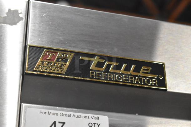 True T-35 Stainless Steel 2 Door Reach In Cooler; 115 Volts, 1 Phase. True Manufacturing Company label visible.