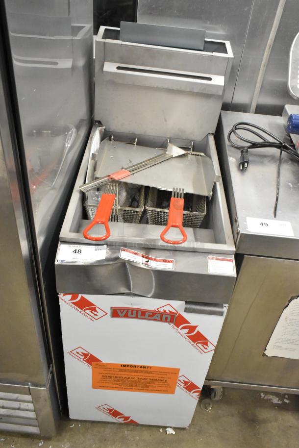Brand new Vulcan LG300-2 stainless steel propane gas fryer, 90,000 BTU, with two metal fry baskets. Scratch and dent condition.