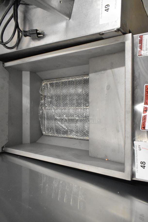 Brand new Vulcan LG300-2 stainless steel propane gas fryer with 2 metal baskets, 90,000 BTU, scratch and dent condition.