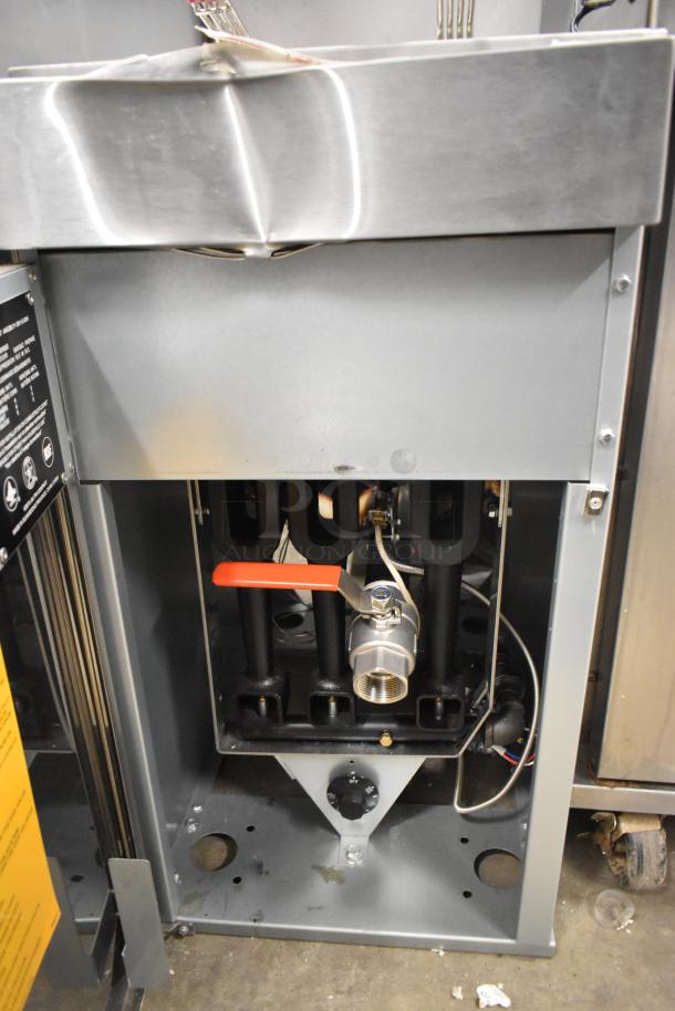 Brand new Vulcan LG300-2 stainless steel propane fryer, 90,000 BTU, with 2 metal baskets. Scratch and dent condition.