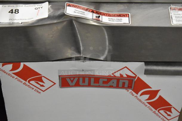 BRAND NEW Vulcan LG300-2 deep fat fryer, stainless steel, propane, 90,000 BTU, includes 2 metal fry baskets. Scratch and dent condition.