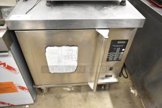 Garland MCOE5LDSMD stainless steel half-size convection oven on casters, solid door, electric, 208V, 3 phase.