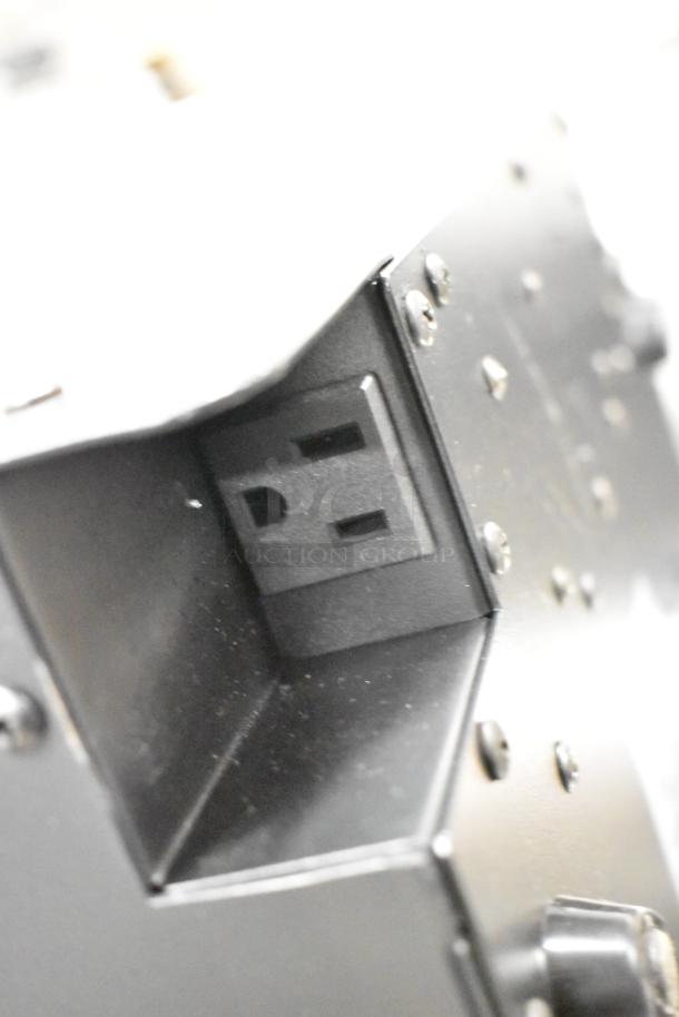 Avantco 177ICW300 countertop induction range outlet, 120V, showing metal construction and fasteners.