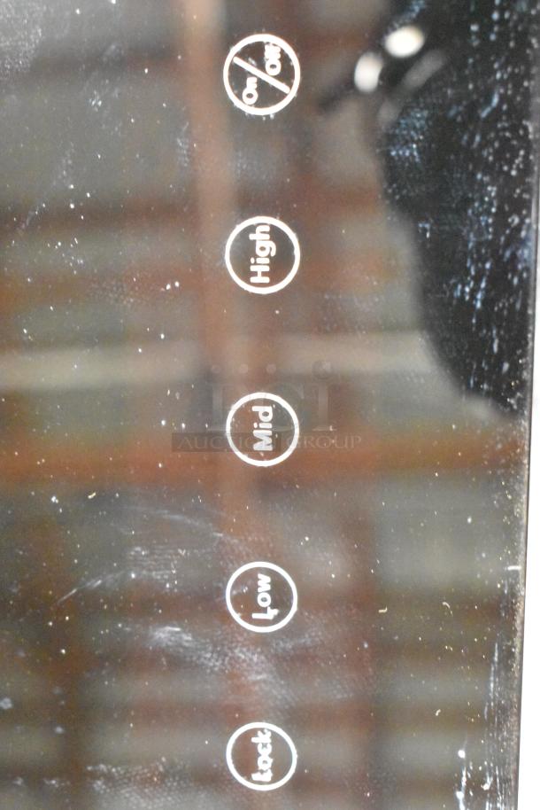 Avantco 177ICW300 induction range controls showing On/Off, High, Mid, Low, and Lock options. Condition: Used.