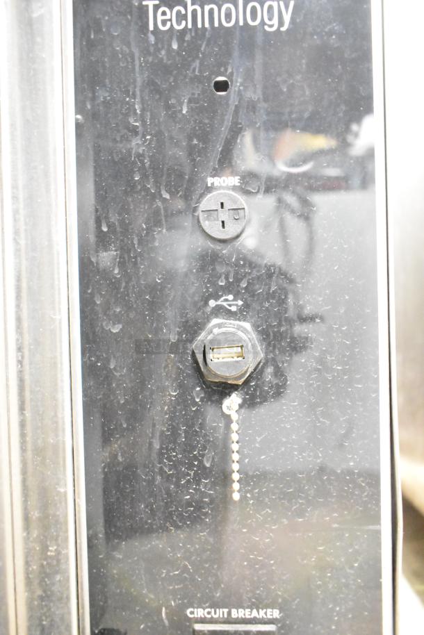 Blodgett Hydrovection Helix convection oven with stainless steel finish, view-through doors, and metal racks. Features probe and USB port.