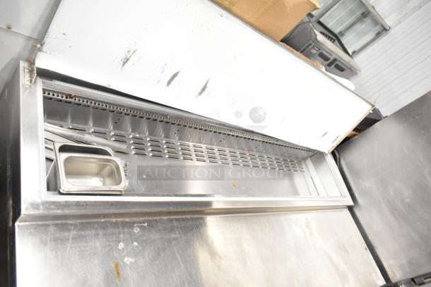 2017 Continental CPA68 stainless steel pizza prep table, 2 drawers, 2 doors, on casters, 115V, 1 phase, commercial use.