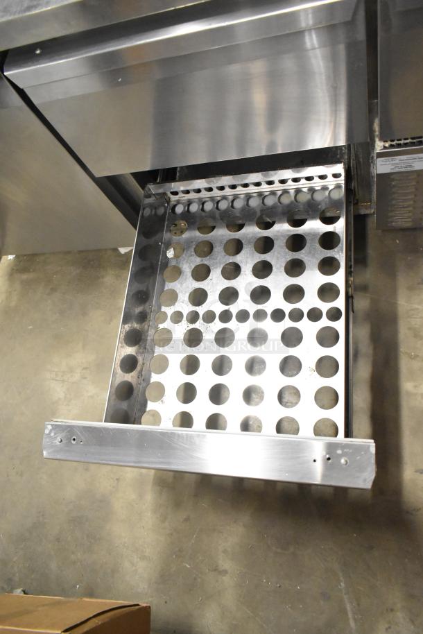 2017 Continental CPA68 stainless steel commercial pizza prep table with 2 drawers, 2 doors, and commercial casters. 115V.