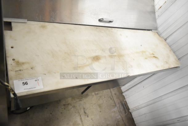 Beverage Air SPE48HC-12C stainless steel sandwich salad prep table, commercial casters, condition shows wear, 115V, 1 phase.