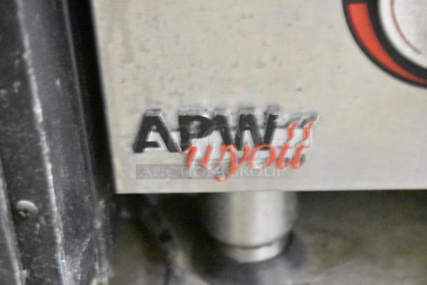 APW Wyott HCRB-2436i charbroiler grill logo detail on stainless steel surface, showing brand marking.