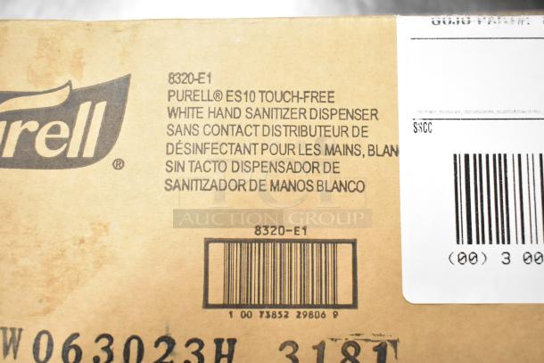 Four brand new boxes including a Purell ES10 touch-free sanitizer dispenser, Scott foam skin cleanser, and Aqua Sparkle detergent.